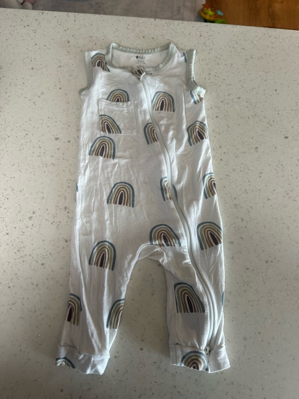 Kyte BABY White Sleeveless Footie with Muted Rainbow Print